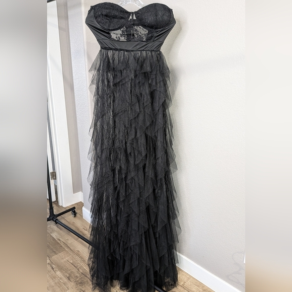 Elegant Black Strapless Gown with Sheer Overlay - Picture 4 of 14